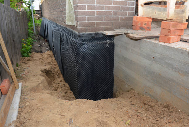 SJ Waterproofing Pros technician performing targeted Foundation Crack Repair assessment in Carmel, IN